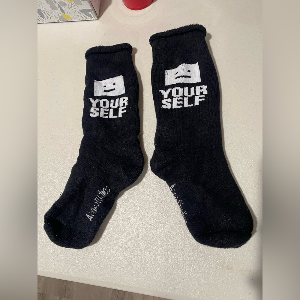 Acne Studio sad face yourself logo shows socks